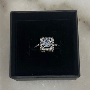 Elegant Silver and Blue Zirconia Ring